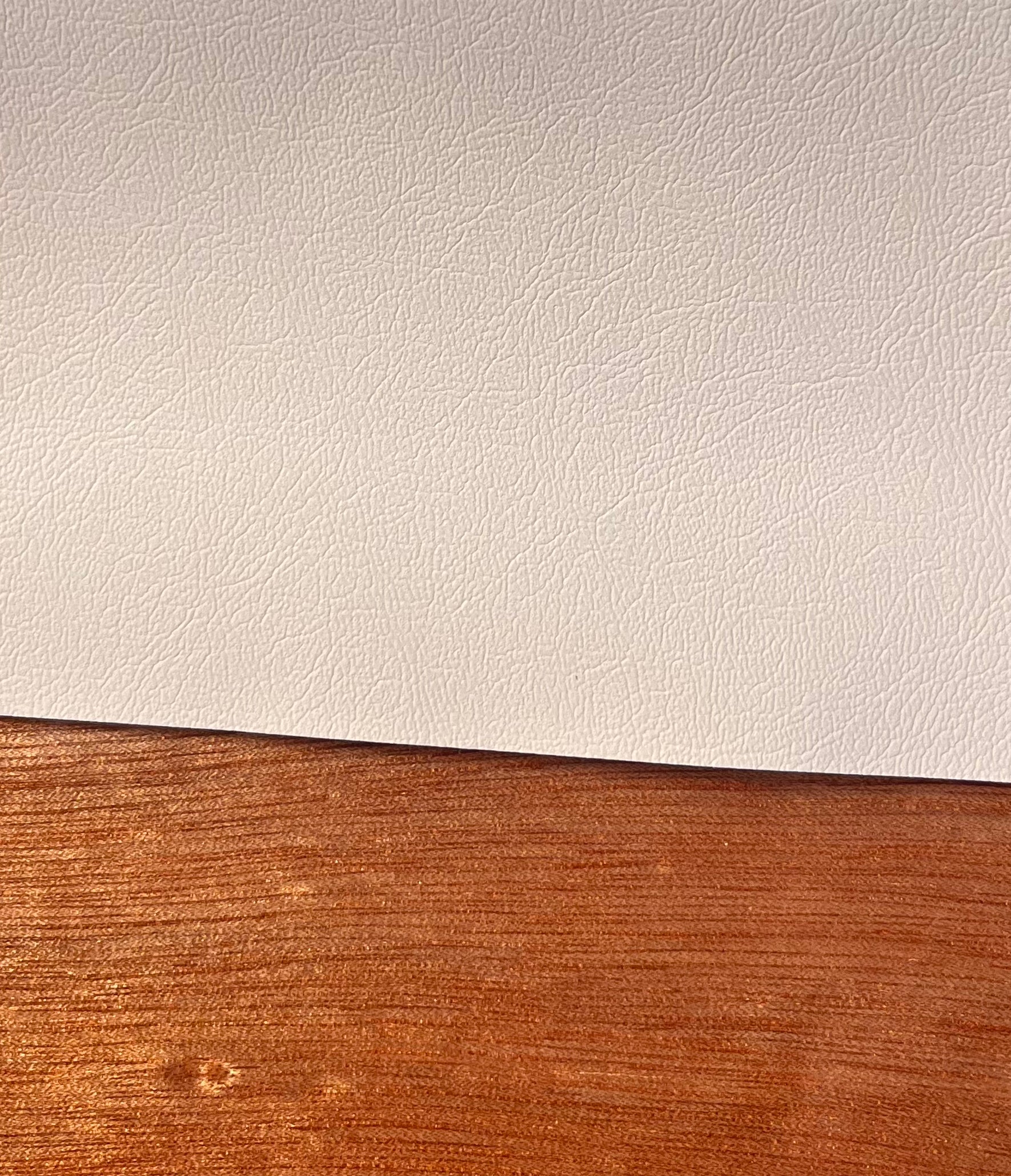 Off-white vinyl material swatch for Rhode Runner seat cushions
