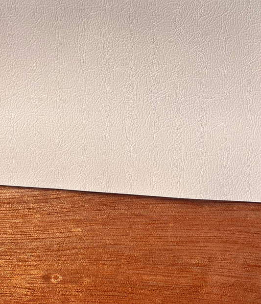 Off-white vinyl material swatch for Rhode Runner seat cushions