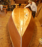Builder coating the hull of his Peeler Skiff Thumbnail