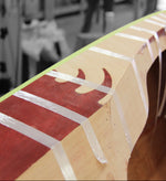 Mark N. used a variety of wood types in his Petrel Play SG kayak to show off the puzzle joint. Thumbnail