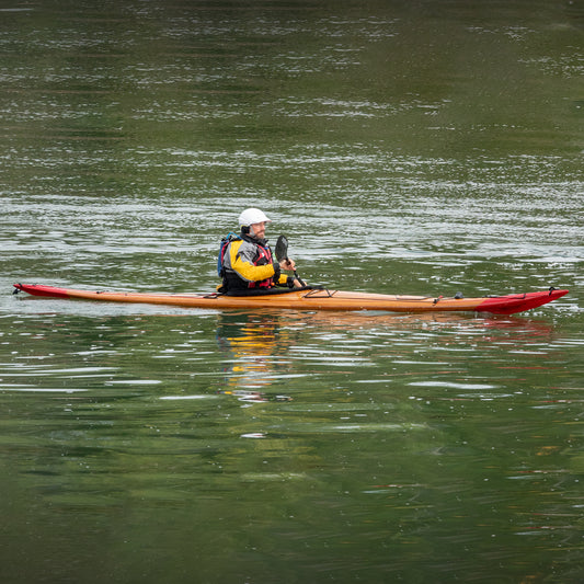 Guillemot Play strip-planked kayak being paddled during the Schoodic Sea-Kayak Retreat, ME in 2021.