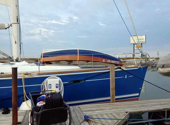 Passagemaker Dinghy Take-apart built by Larry L, seen stowed on deck of a Beneteau 49.