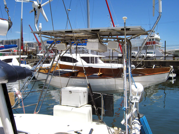 Passagemaker Dinghy Take-apart built by Vince W, seen on davits.