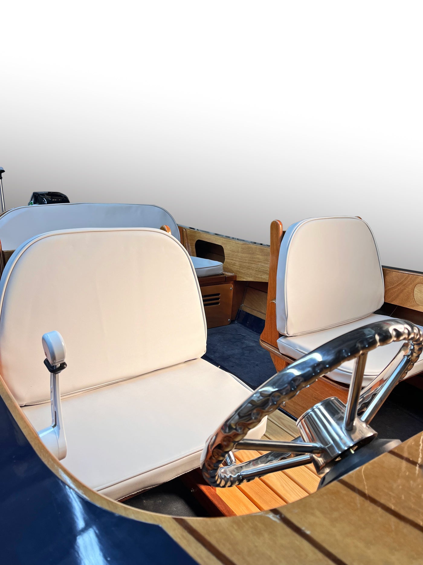 Rhode Runner captain and passenger cushions crafted from Silver outdoor vinyl.