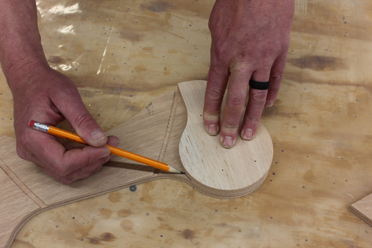Marking the wood parts in the Rug Runner Kit for a roundover.