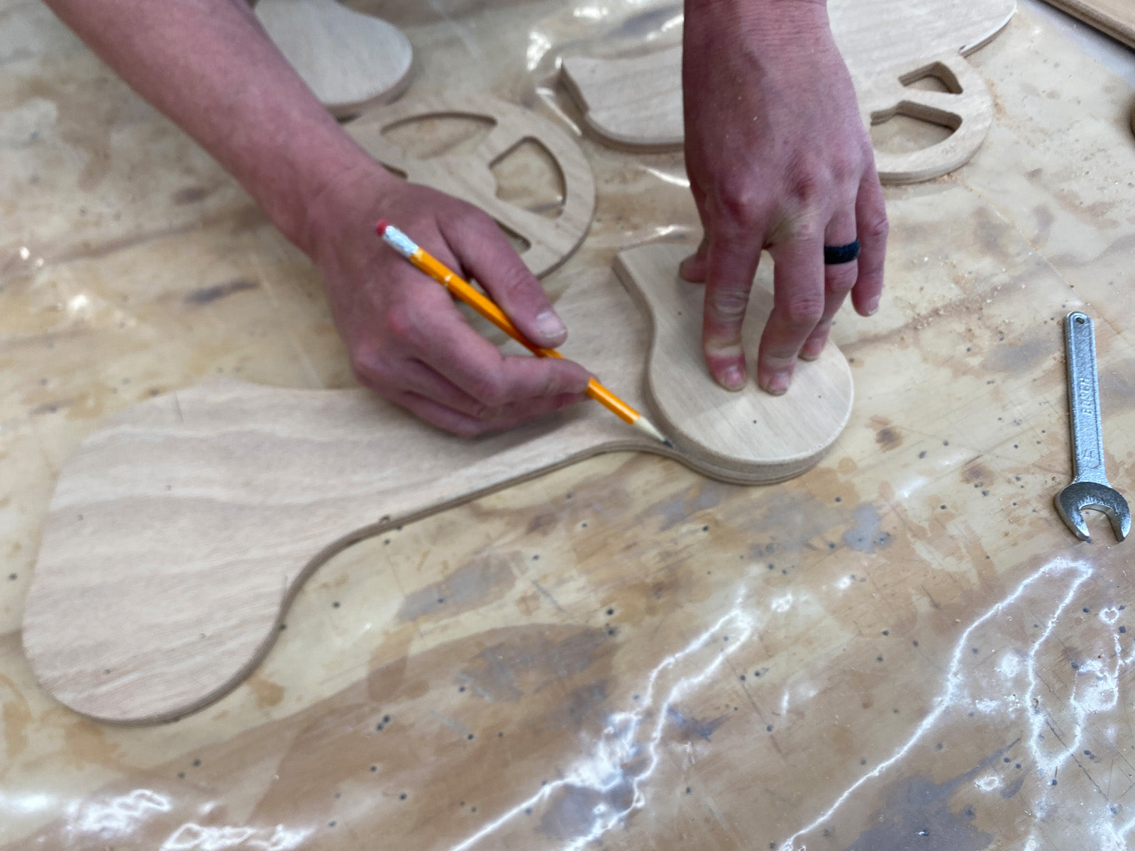 Marking the wood parts in the Rug Runner kit for a roundover.