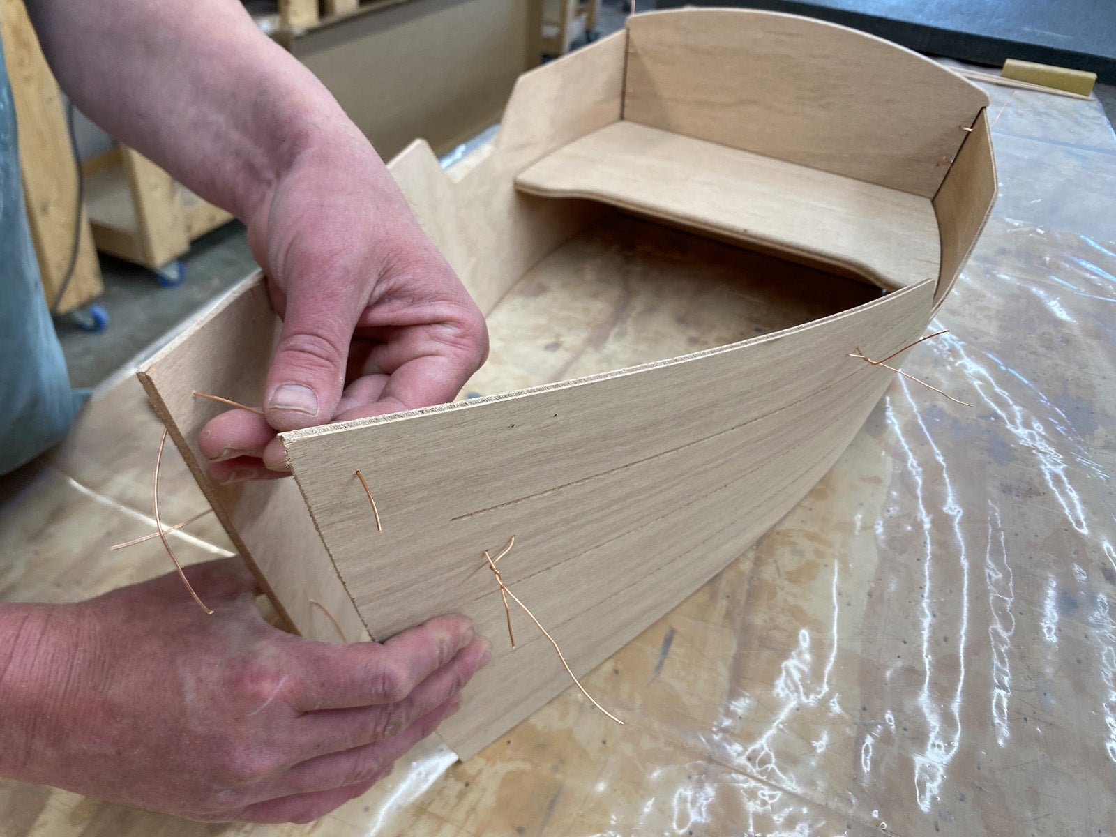 Stitching the bow of the Rug Runner kit. 