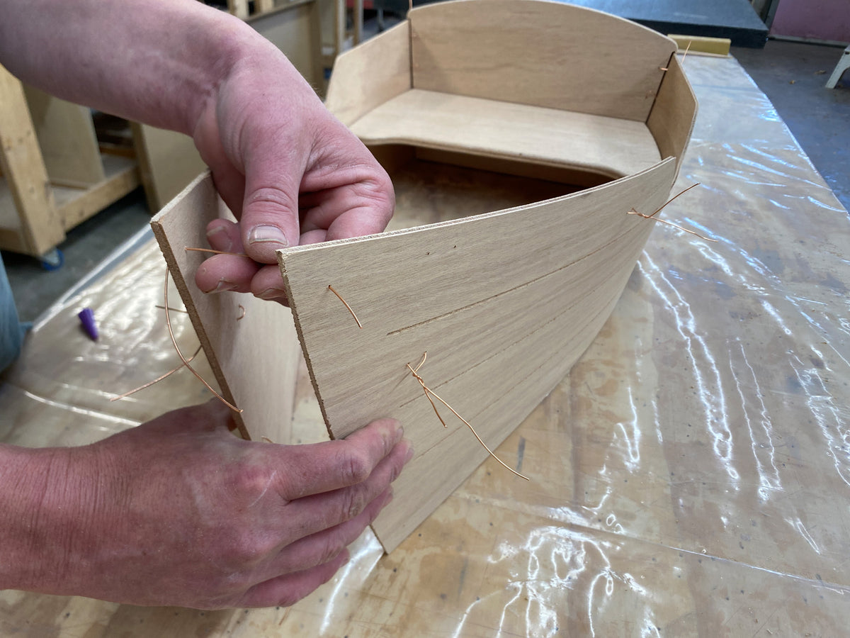 Stitching the bow of the Rug Runner kit. 