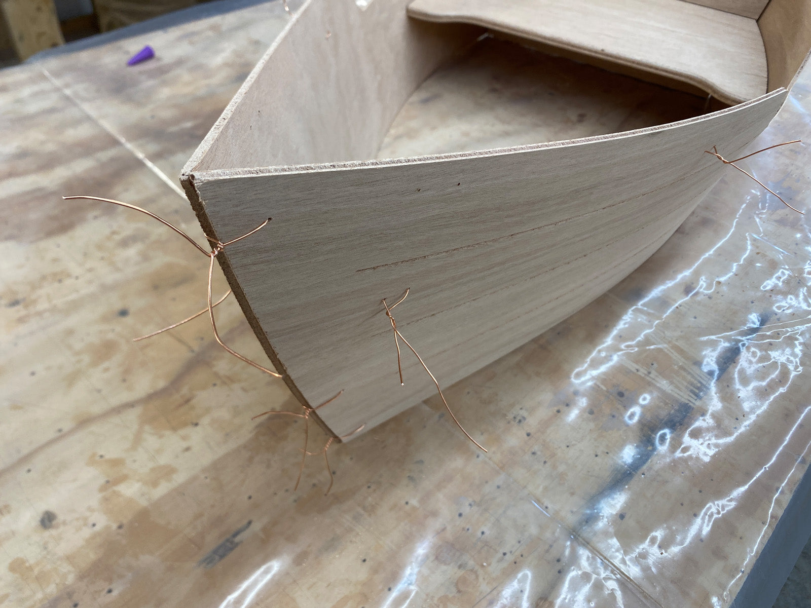 Stitching the bow of the Rug Runner kit. 