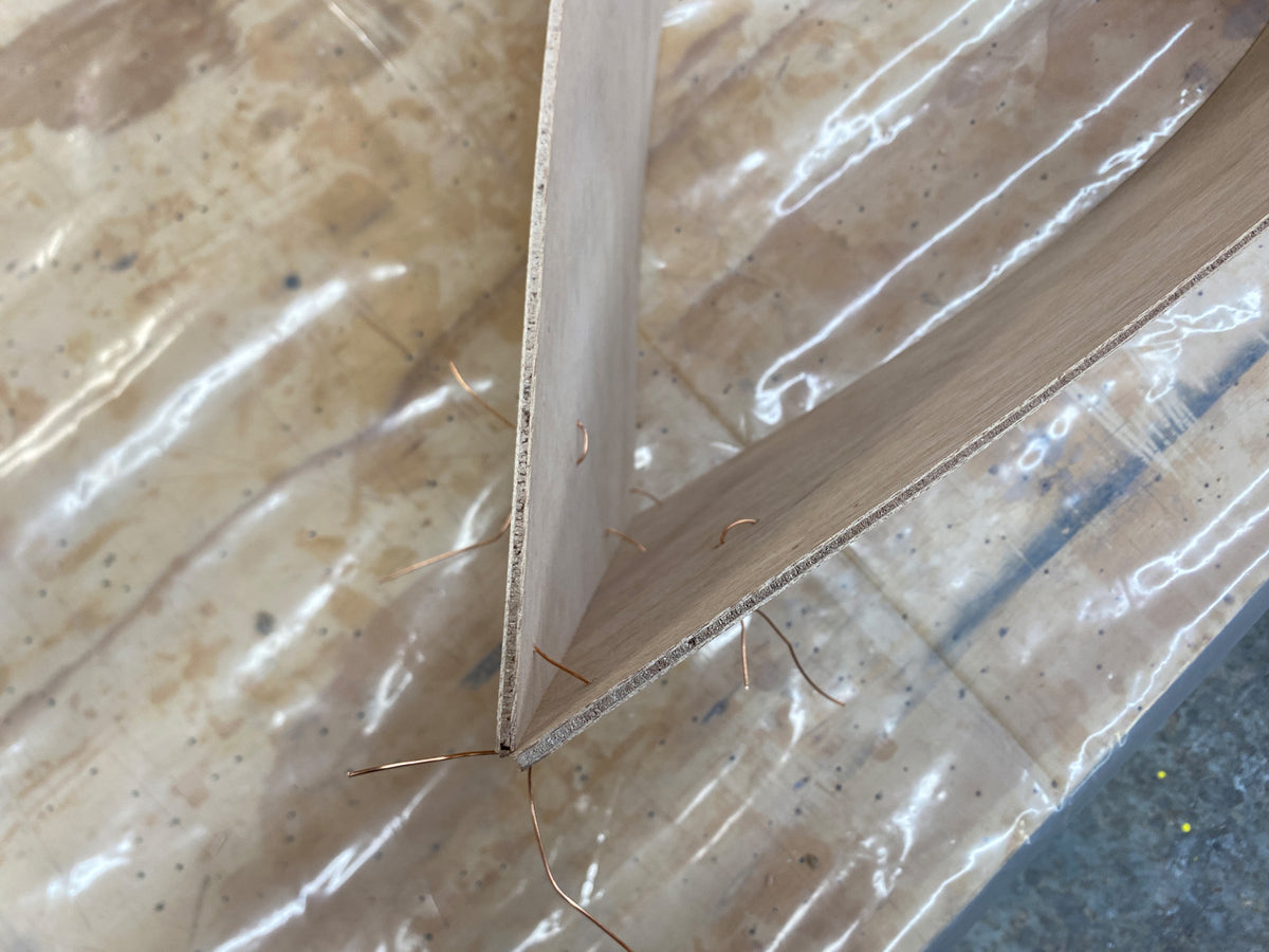 Stitching the bow of the Rug Runner kit. 