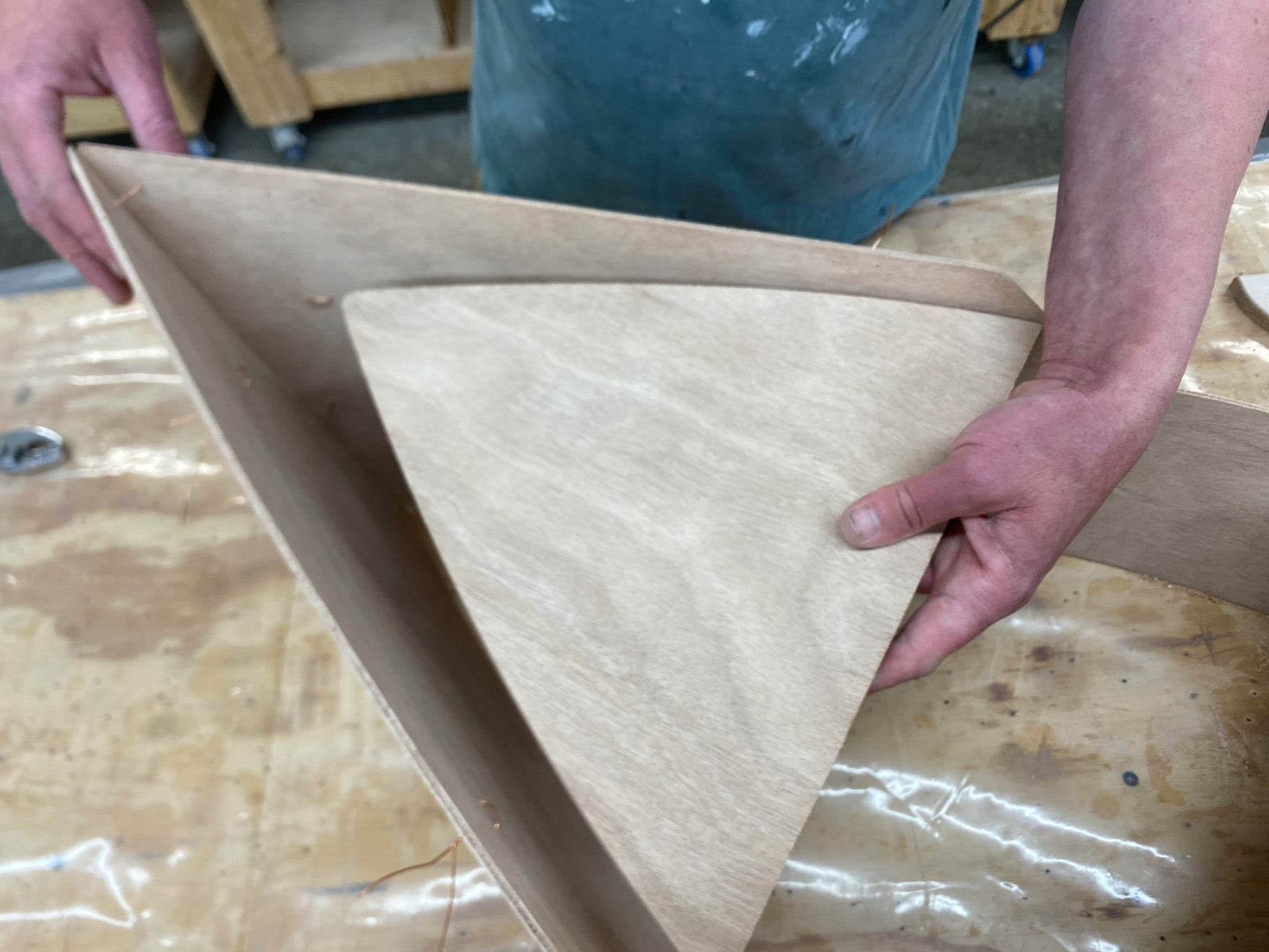 Bonding the foredeck of the Rug Runner kit to the hull panels. 