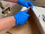 Removing the stitches in preparation for epoxy fillets. Thumbnail