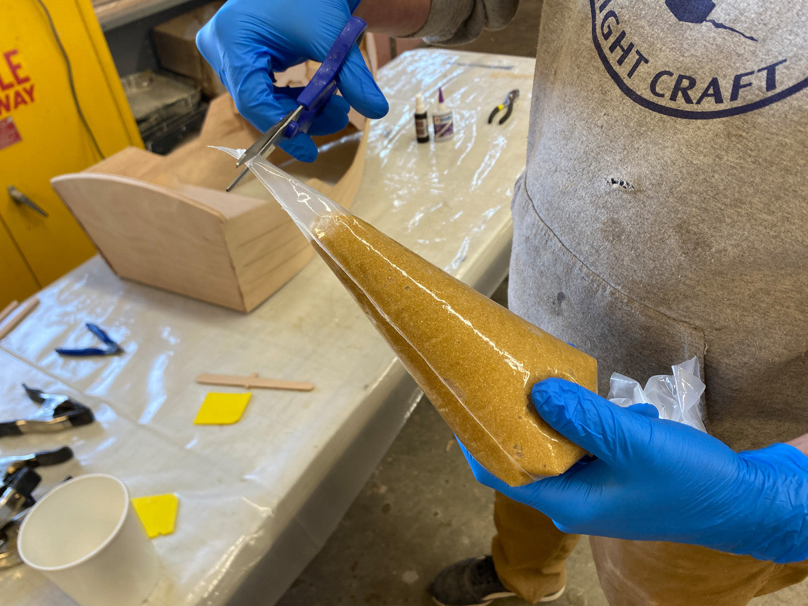 Preparing for application of the epoxy fillets.