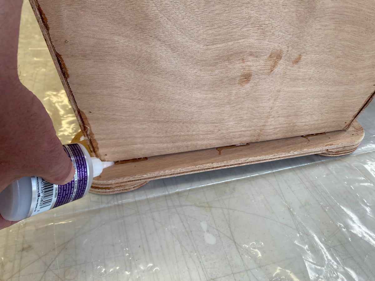 Bonding the caster mounts to the hull.