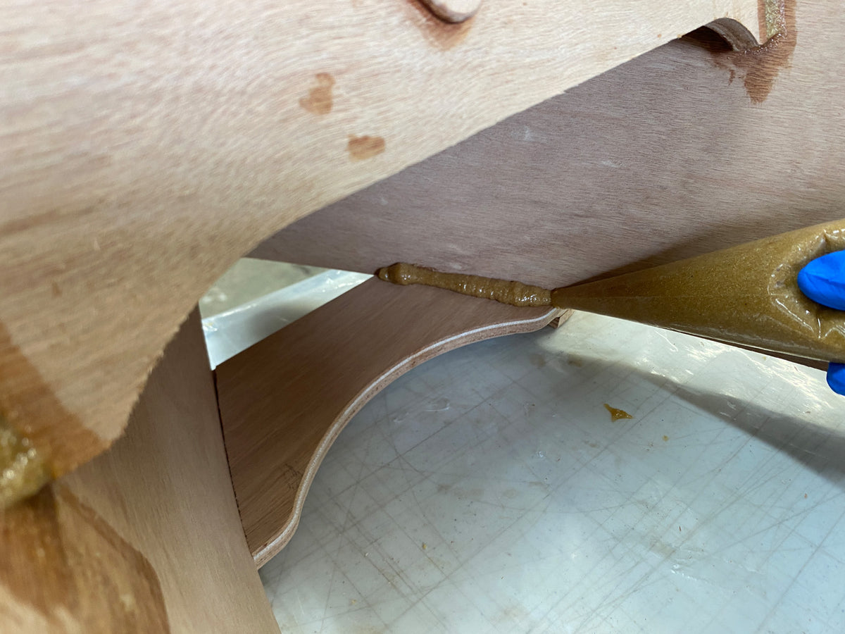 Filleting the caster mounts to the hull.