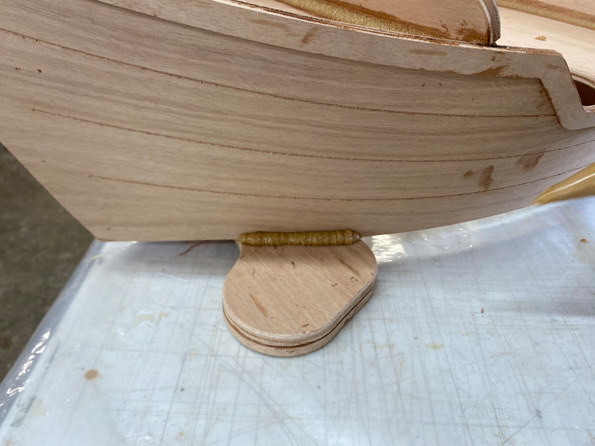 Filleting the caster mounts to the hull.