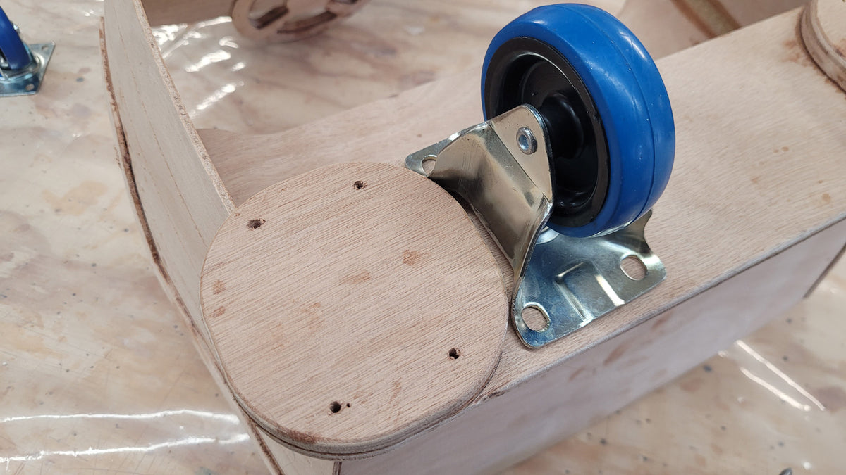 Installing the casters.