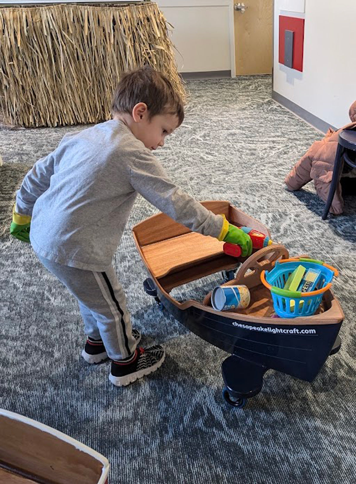 Rug Runner Scooter in use at the daycare facility