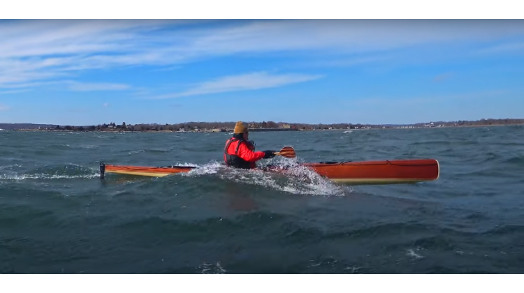 Runner Sea Kayak surfing downwind