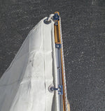 Sail Track installed on a Northeaster Dory Sloop Rig with slider, shackle, stop , and protector. Thumbnail