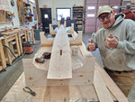 Surge Coastal Rower hull being stitched within the mold.  Thumbnail
