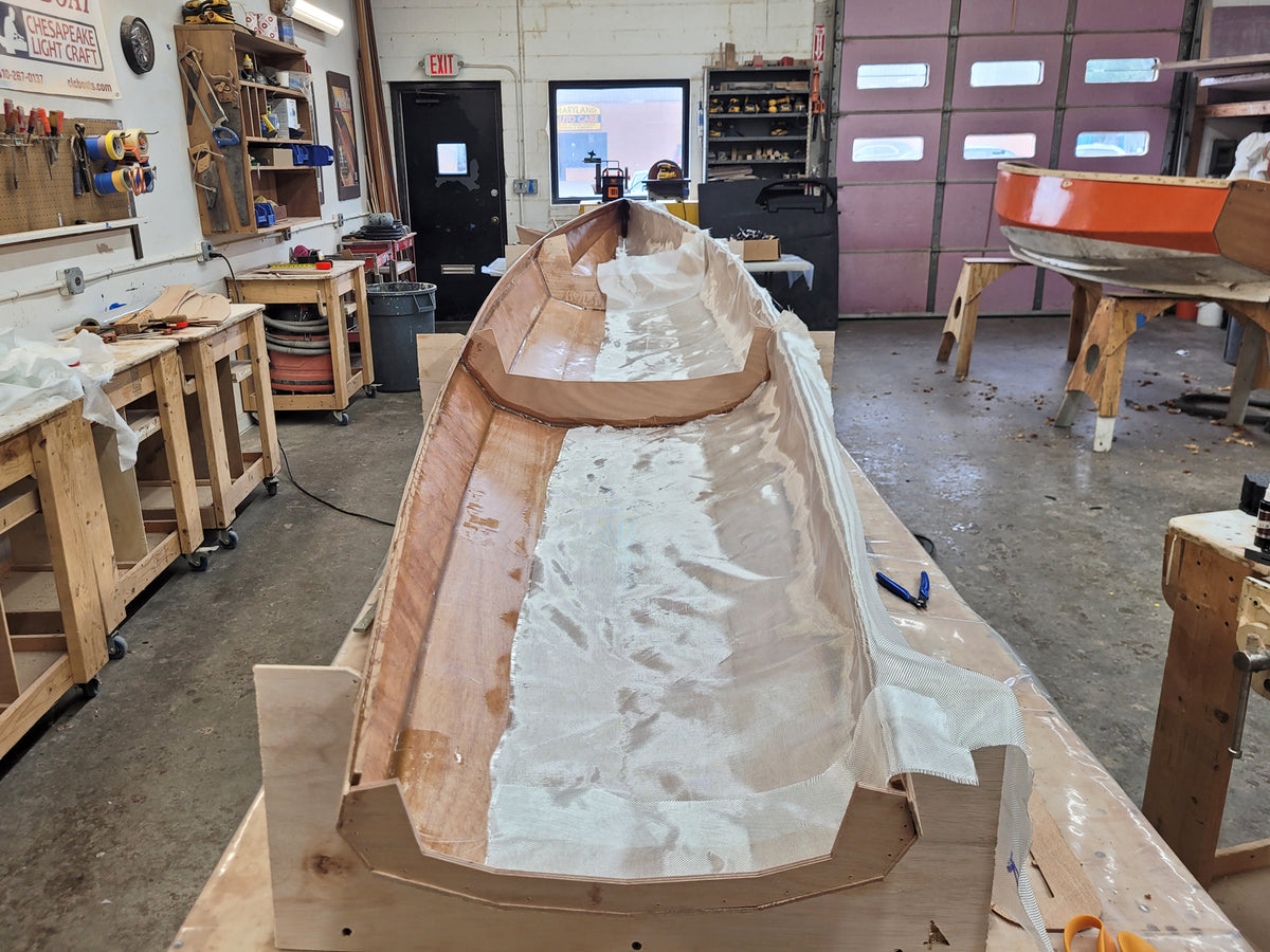 Surge Coastal Rower hull being fiberglassed